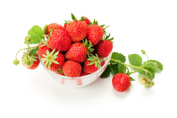 Ripe garden strawberries in a glass vase.