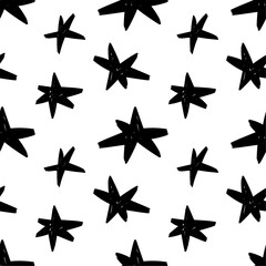 Seamless pattern with ink doodle stars. Black stars on white background.