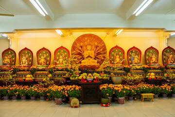 Bodhisattva And Buddha Nirvana Statues On Pagoda In Ho Chi Minh City, Vietnam.