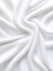 Obraz premium Soft draped white fabric texture on a smooth background.