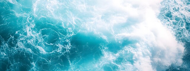 Photo of a turquoise sea with crashing waves, symbolizing the vastness and depth of oceanic power