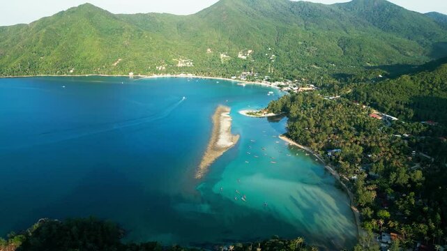 Turquoise sea water green mountains of koh phan gan Thailand aerial drone island landscape