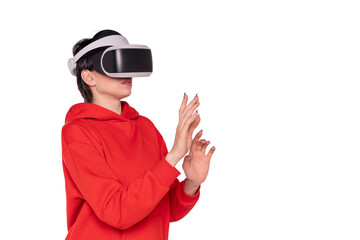 Exploring new virtual worlds, a woman interacts with immersive technology in a bright setting