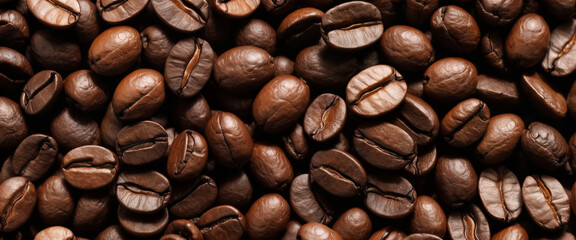 Fototapeta premium Roasted coffee beans forming a textured background image