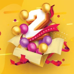 2 years anniversary logo template design on gift box, yellow background and balloons. 2nd anniversary celebration background with red ribbon and balloons. gift box idea for anniversary invitation card © max vector