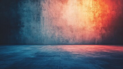 A textured wall with gradient colors transitioning from blue to orange, creating a dramatic backdrop for artistic displays.