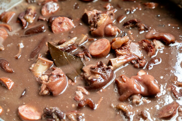 Classic Brazilian feijoada with traditional ingredients