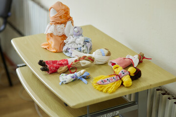 The creative process of creating Ukrainian toys, dolls from threads.