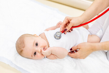 medicine, health, Pediatrics, pediatrician examines the child in the clinic and makes a massage