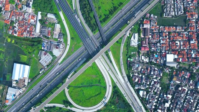 Established Aerial View of Pasir Koja Interchange, the meeting point of Soroja Toll Road, Purbaleunyi Toll Road and Jakarta-Bandung High Speed ​​Rail Line, Bandung, Indonesia