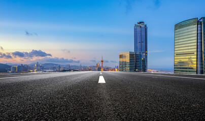 Serene Urban Sunset: Embracing Modern Architecture and Open Roads