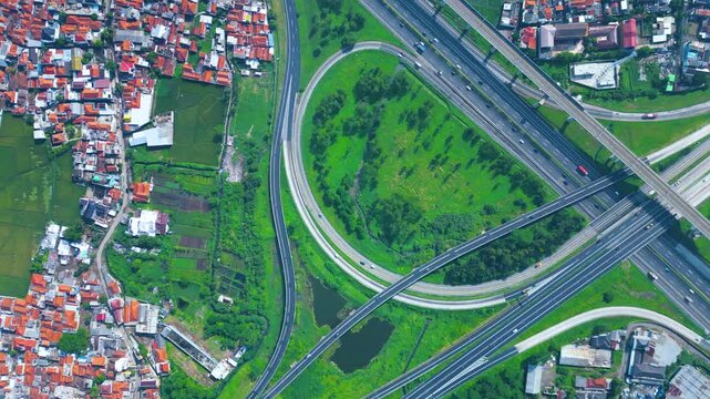 Established Aerial View of Pasir Koja Interchange, the meeting point of Soroja Toll Road, Purbaleunyi Toll Road and Jakarta-Bandung High Speed ​​Rail Line, Bandung, Indonesia