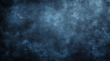 Obraz premium A dark blue abstract background with a textured, rough surface.