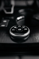 Stylish driving mode control panel in car with intuitive icons for various driving conditions....
