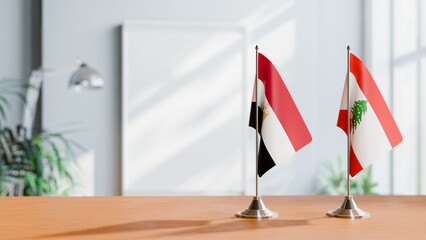 FLAGS OF EGYPT AND LEBANON ON TABLE