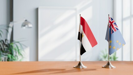 FLAGS OF EGYPT AND TUVALU ON TABLE
