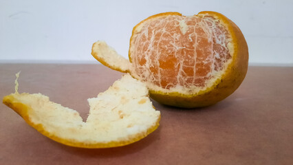peeled orange on table