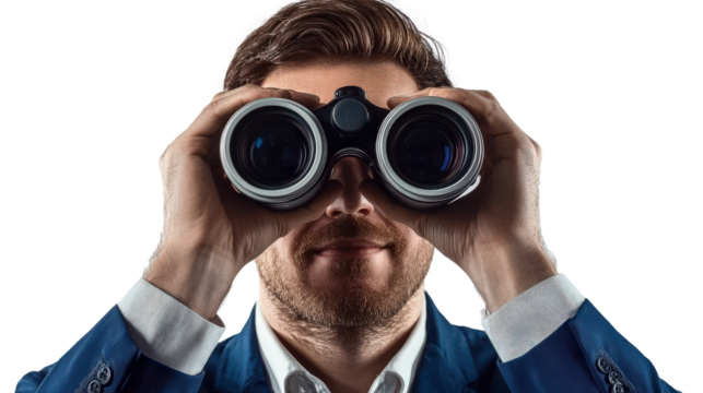 Person observing through binoculars on a gray background