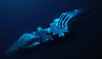 Abstract illustration of two hands holding puzzle pieces approaching in low poly style. Blue geometric background depicting synergy partnership and business teamwork concept by wireframe mesh