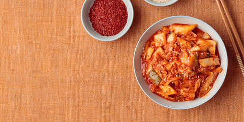 Kimchi, Kimchee in the Bowl, Red Spicy Kim Chi, Hot Fermented Napa Cabbage, Traditional Jimchi on a table