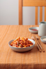 Kimchi, Kimchee in the Bowl, Red Spicy Kim Chi, Hot Fermented Napa Cabbage, Traditional Jimchi on a table