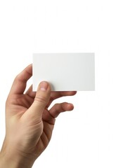 Obraz premium Hand holding a blank business card, isolated on white background