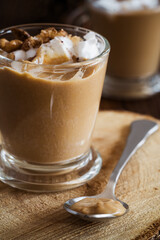 Autumn dessert pumpkin pudding  with whipped cream