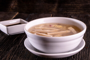 Chinese Tofu Vegetable Soup on wood table. Chinese food. Food concept.