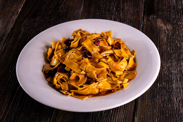 Shallot Chili Oil Noodles on a wooden background. Food concept. Chinese food.