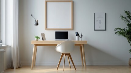 Minimalist home office setup with a wooden desk, plant, and blank wall frame.