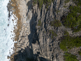The rugged coastline of a dramatic cliffside