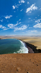 CLIFFS OVER THE BEACH. PARACAS NATIONAL RESERVE, RED BEACH. PACIFIC OCEAN. PARACAS, PERU.