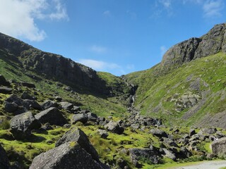 Scenic Summer Landscape: Green Hills And Rocky Mountains Of Ireland