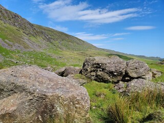 Scenic Beauty Of Ireland: Verdant Hills And Rocky Landscapes In Summer