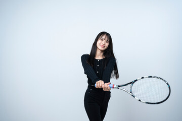 テニスをする女性