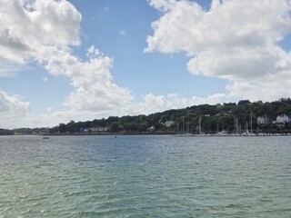 Tranquil Waterscape With Little Waves And Cloud Reflections