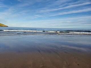 Sunny Summer Day At The Blue Ocean Shoreline