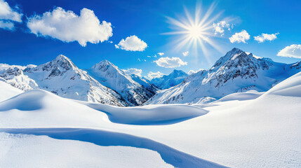 Obraz premium Majestic snowy mountain landscape under a bright sun and vibrant blue sky with soft clouds drifting above