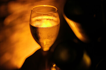 Celebration, night club with party lights and glass of champagne sparkling wine, dancing with wine, wedding event