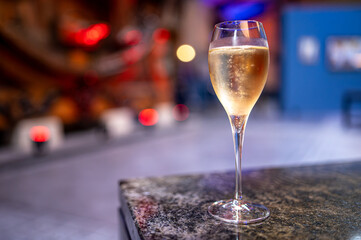Celebration, night club with party lights and glass of champagne sparkling wine, dancing with wine, wedding event