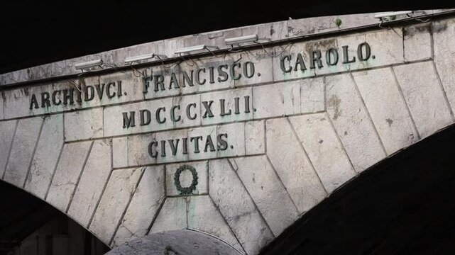 The Triple Bridge or Franciscan Bridge, a group of 3 bridges across the Ljubljanica River. Inscription means in Englisch: To Archduke Franz Karl in 1842 by the Town.