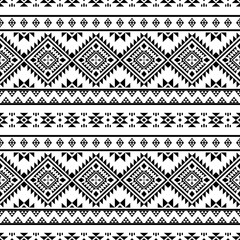 Ancient echoes Aztec geometric seamless patterns southwest Navajo Native American tribal ethnic black and white for textile printing