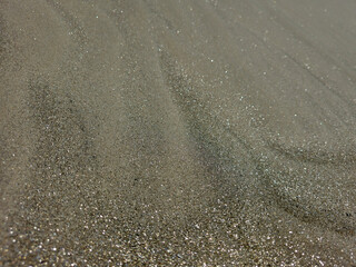 Waves of sand loose sand, texture.