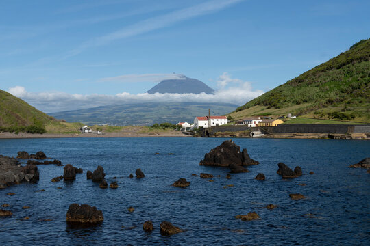 Horta city in Faial island Azores Portugal The island of Pico in background and Porto Pim beach