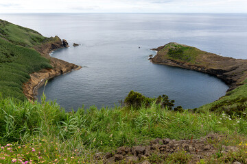 Obraz premium The couple of volcano craters from Monte da Guia Horta city in Faial island Azores Portugal
