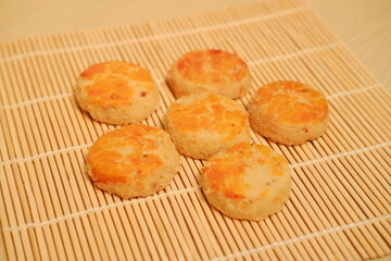 peanut cookies on a bamboo mat
