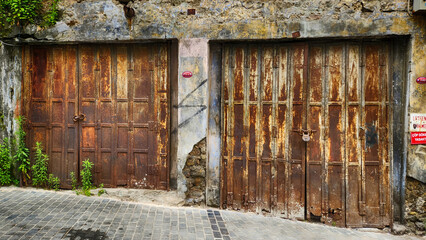 Naklejka premium Trabzon's old rusty iron inn doors and locks