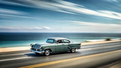 Vintage car going in a high way next to the ocean
