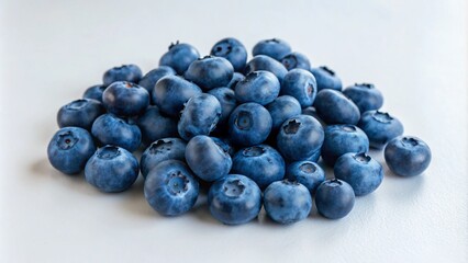 Pile of fresh blueberries on white background.