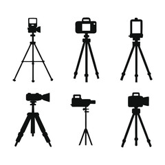 Camera on a tripod silhouette on a white background